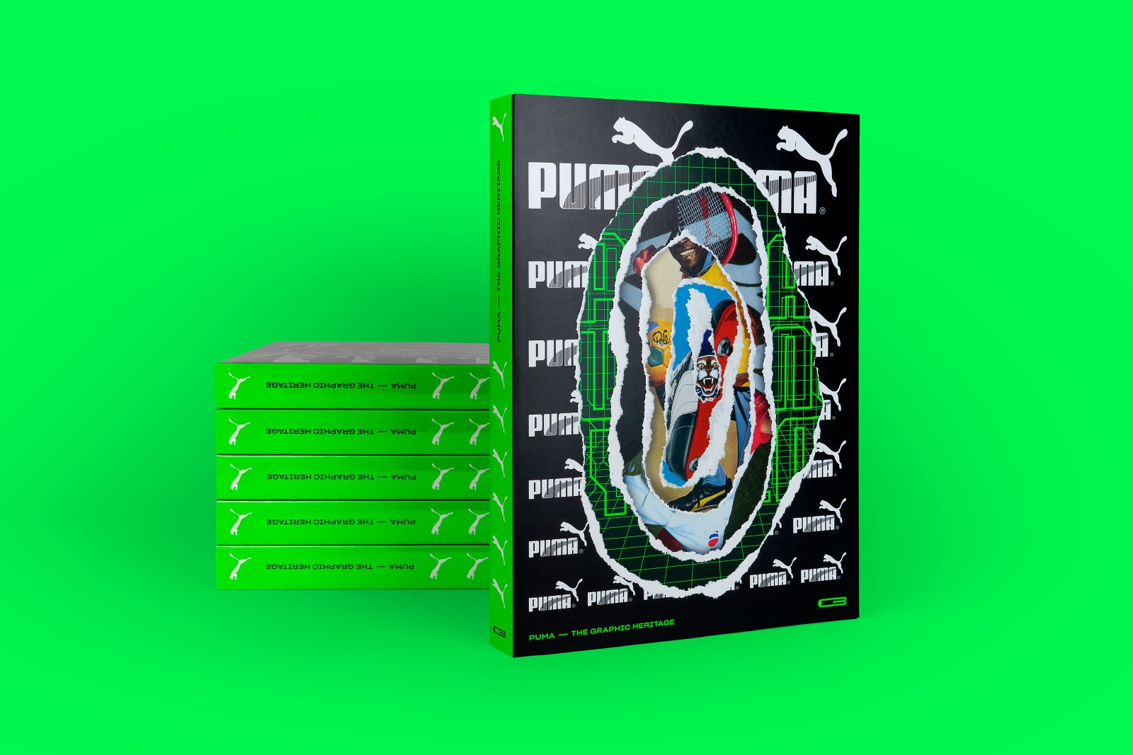 Visualization of the PUMA book in front of a stack of other copies, featuring the European Design Award 2024 badge
